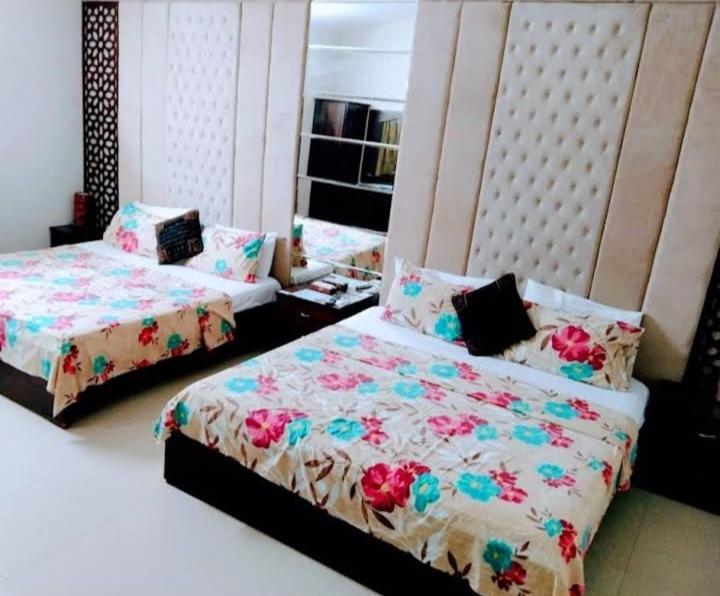 Hotel Rooms Dha Карачі Номер фото